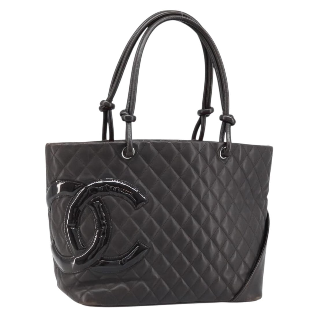 CHANEL Cambon Line Leather Tote in Brown with Silver CC: CHANEL Cambon Line Leather Tote in Brown with Silver CC CHANEL Cambon Line Matelasse tote bag in leather with a brown and silver color scheme. Made in Italy, this women's bag features a structured tot