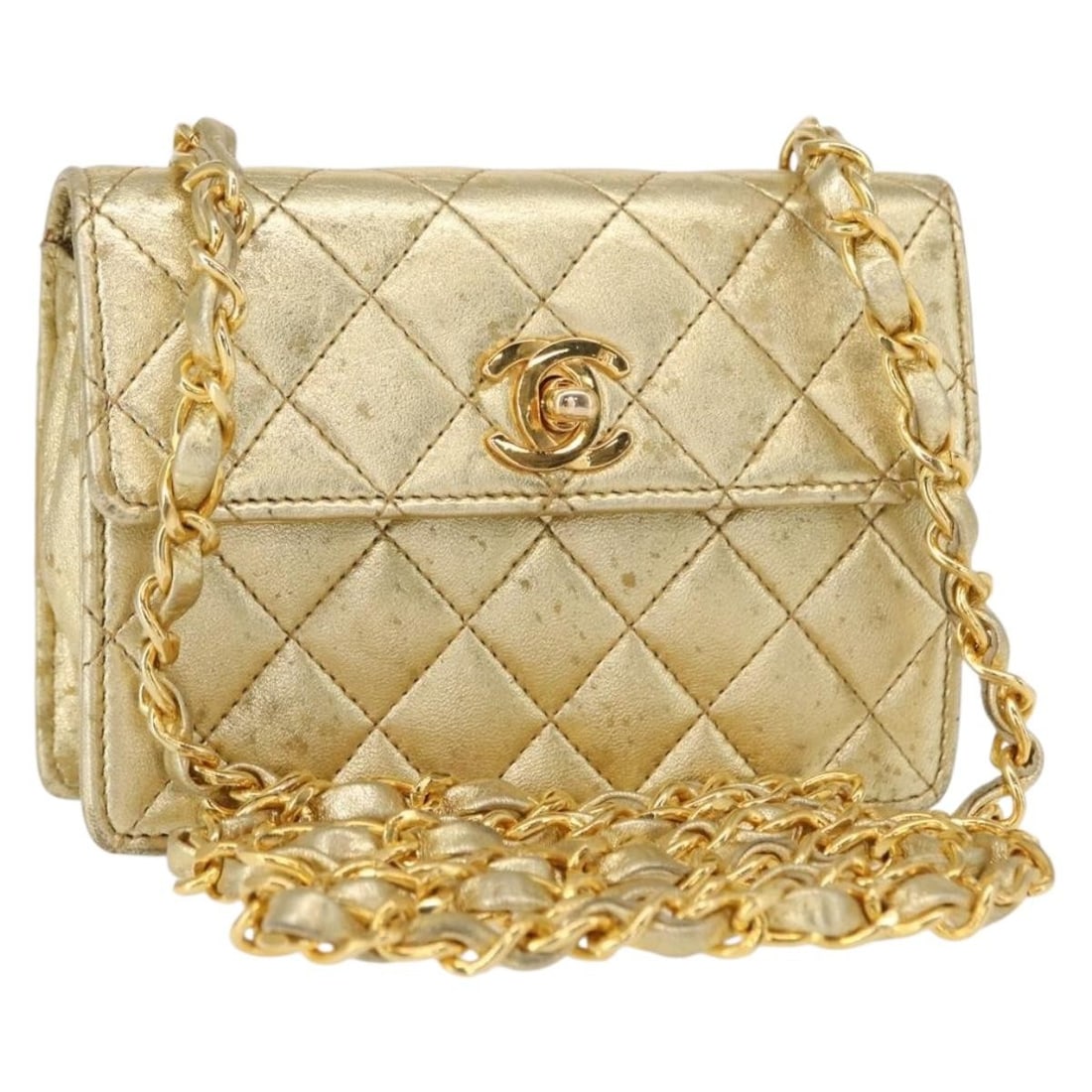 CHANEL Mini Matelasse Lamb Skin Shoulder Bag Gold CC: CHANEL Mini Matelasse Lamb Skin Shoulder Bag Gold CC Mini matelasse chain shoulder bag in gold lamb skin. This women's shoulder bag was made in France and features a chain strap. Please note that only