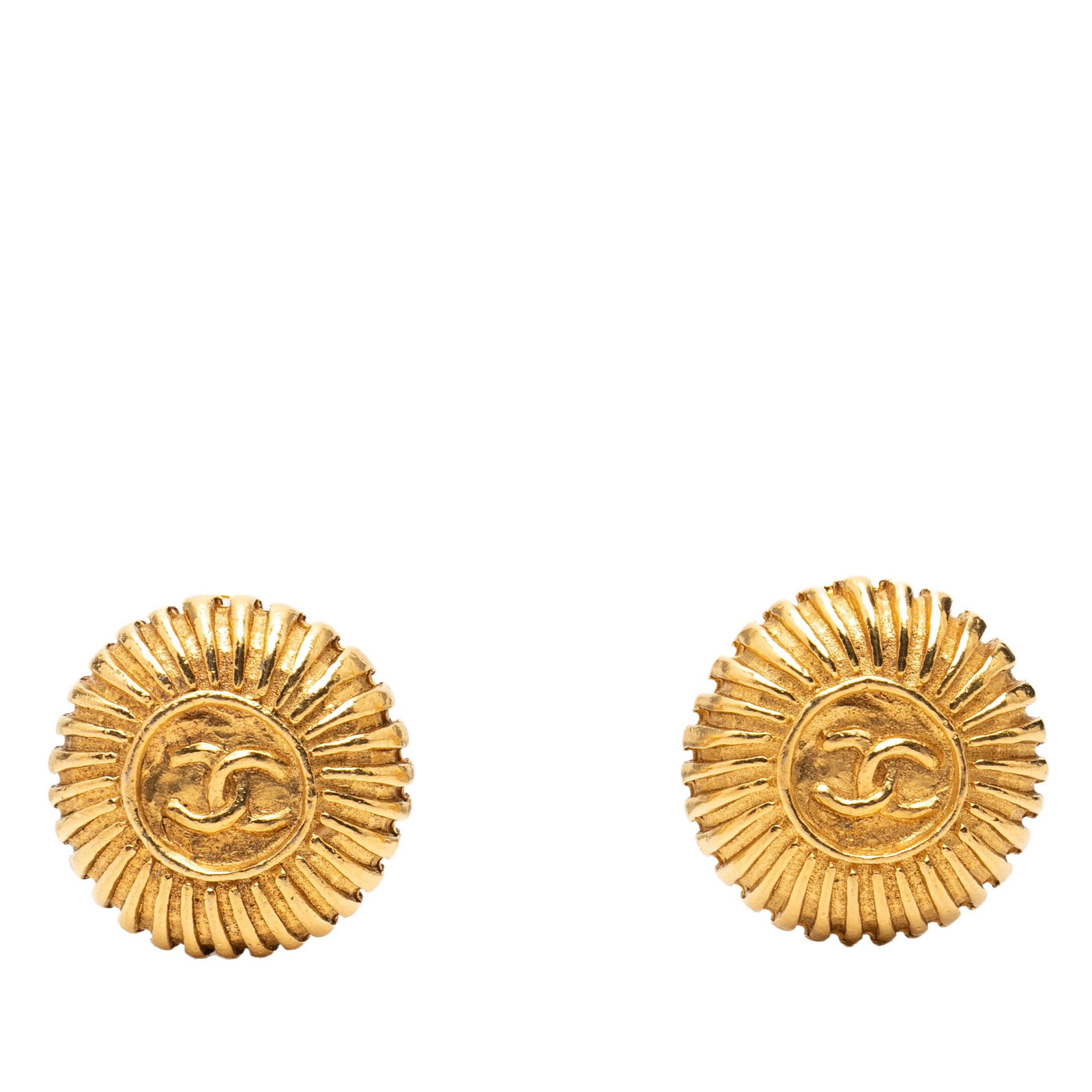 Chanel round gold plated clip on earrings CC: Chanel round gold plated clip on earrings CC These Chanel CC round clip-on earrings are crafted from gold-plated metal and feature the iconic CC logo. Designed with back clip-on closures, they offer a