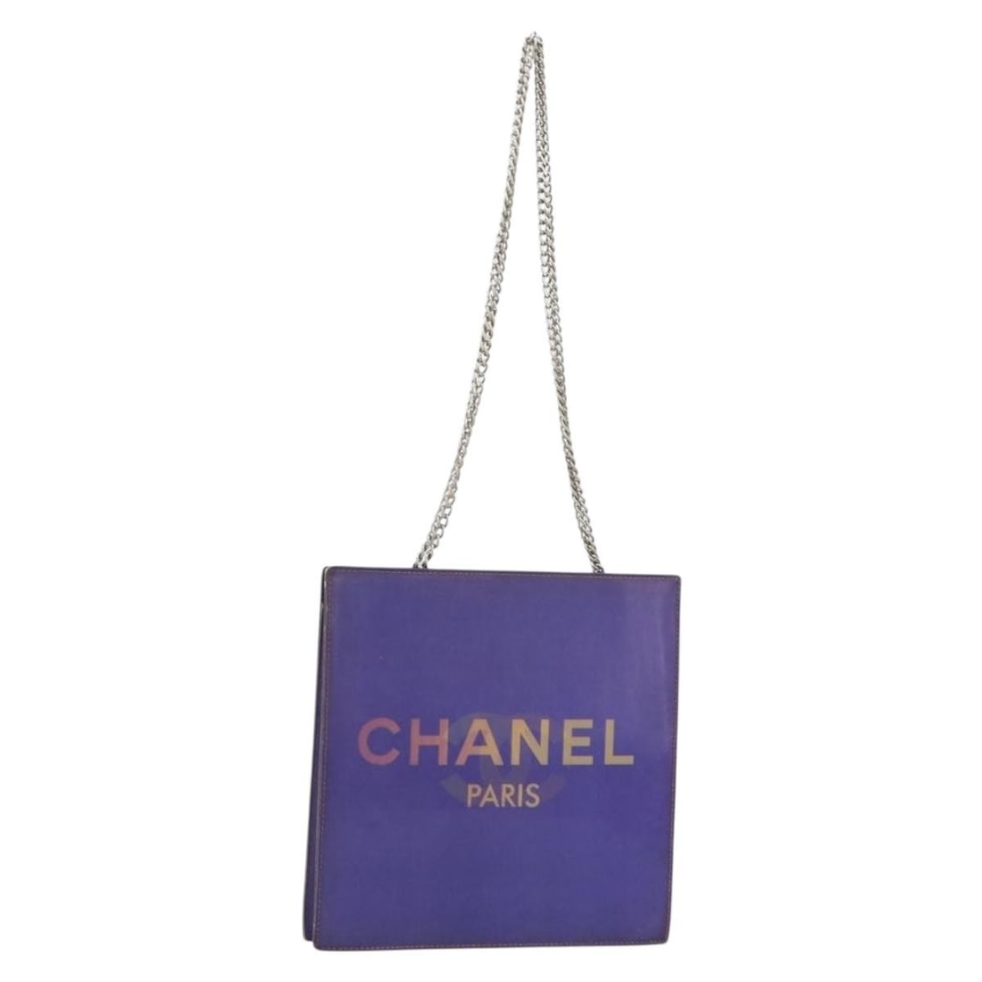 CHANEL Purple Vinyl CC Chain Strap Shoulder Bag: CHANEL Purple Vinyl CC Chain Strap Shoulder Bag Authentic CHANEL hologram chain shoulder bag in purple vinyl. This women's shoulder bag is made in France and features a compact silhouette with a chain