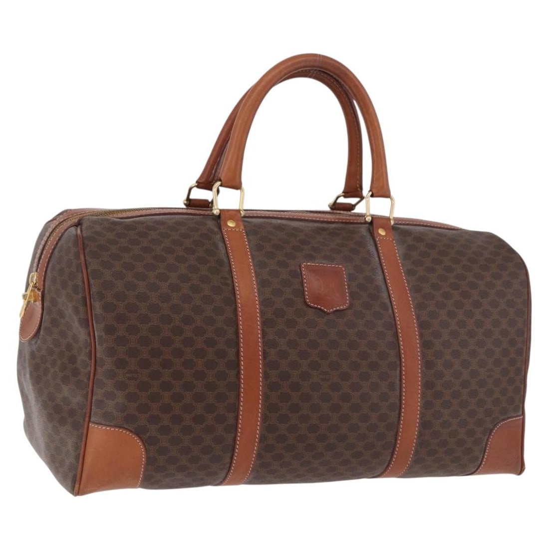 CELINE Macadam Canvas Boston Bag Brown PVC Leather Italy: CELINE Macadam Canvas Boston Bag Brown PVC Leather Italy Celine Macadam canvas Boston bag in brown with gold-tone accents, crafted with PVC leather trim. Made in Italy, this women's bag is offered wit