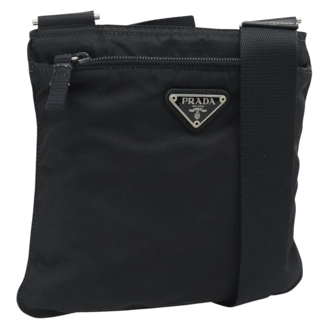 PRADA Black Nylon Shoulder Bag Silver Tone Made in Italy: PRADA Black Nylon Shoulder Bag Silver Tone Made in Italy Authentic Prada shoulder bag in black nylon with silver-tone accents. Made in Italy, this women's bag is offered without the original box or du