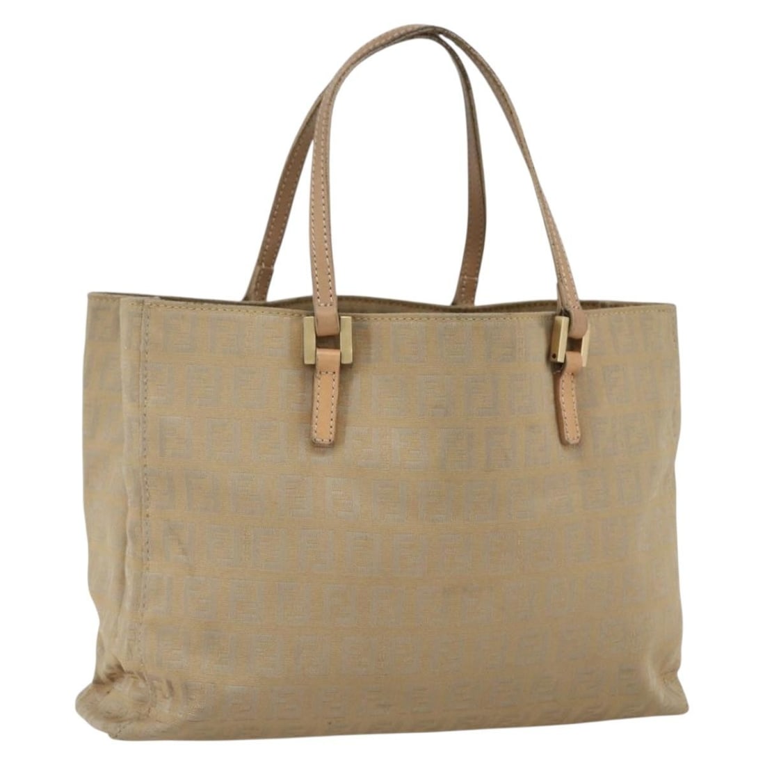 Beige Gold Zucchino Canvas Handbag by FENDI Italy: Beige Gold Zucchino Canvas Handbag by FENDI Italy This FENDI Zucchino Canvas hand bag features a beige and gold exterior with the iconic Zucchino pattern. Crafted in Italy, it is designed for everyday