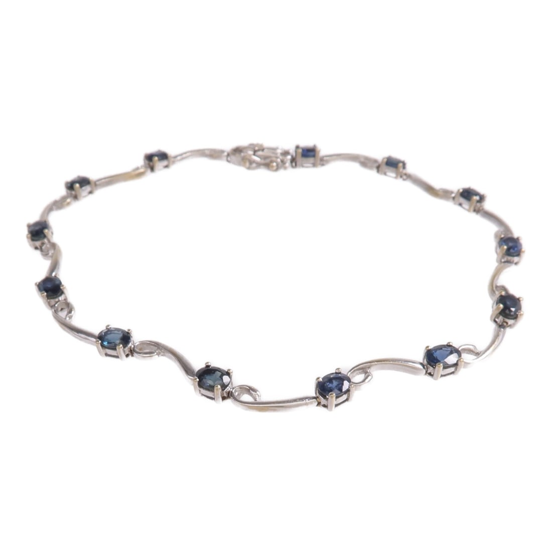 JEWELRY Sapphire Blue Bracelet in 18K White Gold: JEWELRY Sapphire Blue Bracelet in 18K White Gold Women's bracelet in K18WG white gold with sapphire, presented in blue and silver tones. The item is listed in very good AB condition and has an approxi