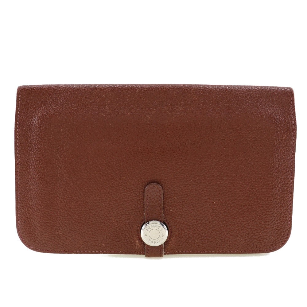 Hermes Leather Dogon Duo Wallet for Women Burgundy: Hermes Leather Dogon Duo Wallet for Women Burgundy This Hermes Dogon Duo Combined Wallet is crafted from burgundy leather designed for female use. It features a compact size suitable for everyday carr