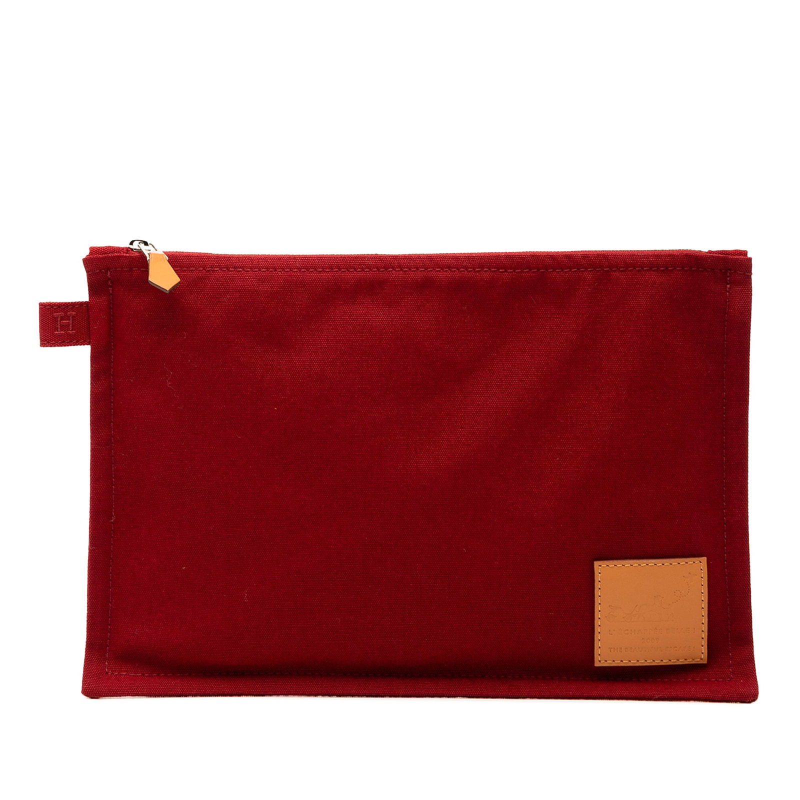 Hermes Red Canvas Toile Bora Bora MM Zippered Pouch France: Hermes Red Canvas Toile Bora Bora MM Zippered Pouch France The Hermes Toile Bora Bora Pouch MM features a red canvas body with a top zip closure. This versatile pouch is crafted in France and