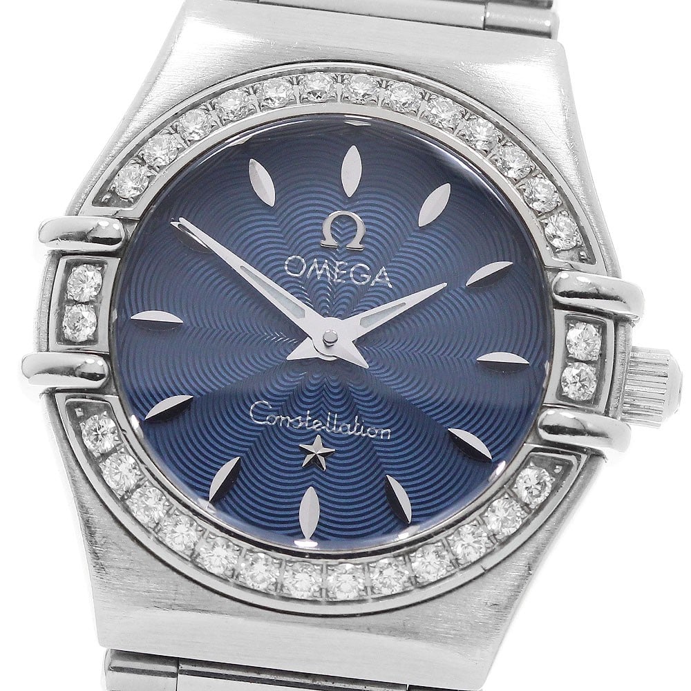 OMEGA Constellation Mini 1466.82 womens quartz stainless steel watch: OMEGA Constellation Mini 1466.82 womens quartz stainless steel watch Pre-owned OMEGA Constellation Mini women's wristwatch with a quartz movement and navy dial. This watch-only piece features a stainl
