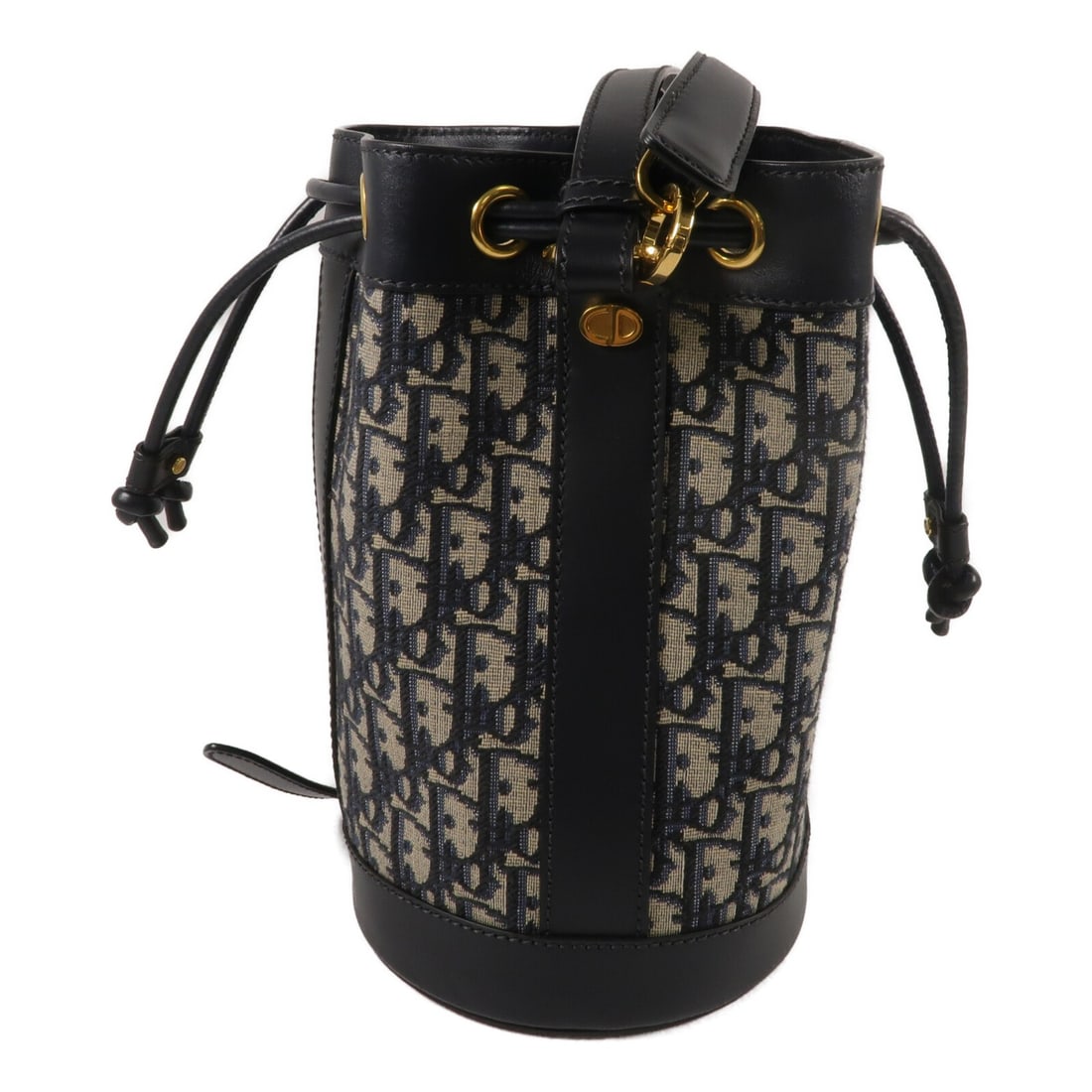 Dior Small Oblique Backpack Navy GHW: Dior Small Oblique Backpack Navy GHW A small navy Dior backpack in Oblique material with gold-tone hardware. It features one interior open pocket and comes in very good AB condition. Accessories are n