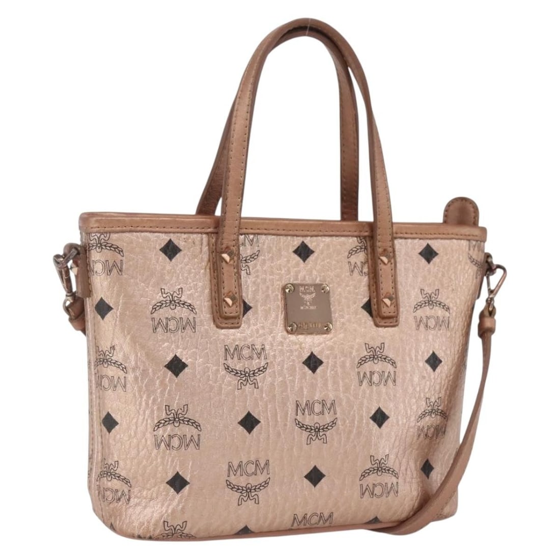 MCM Anya Pink Gold PVC Leather Two Way Handbag with Shoulder Strap: MCM Anya Pink Gold PVC Leather Two Way Handbag with Shoulder Strap This MCM Anya hand bag features the signature Vicetos logogram design in pink and gold PVC leather. It is a versatile 2-way style tha