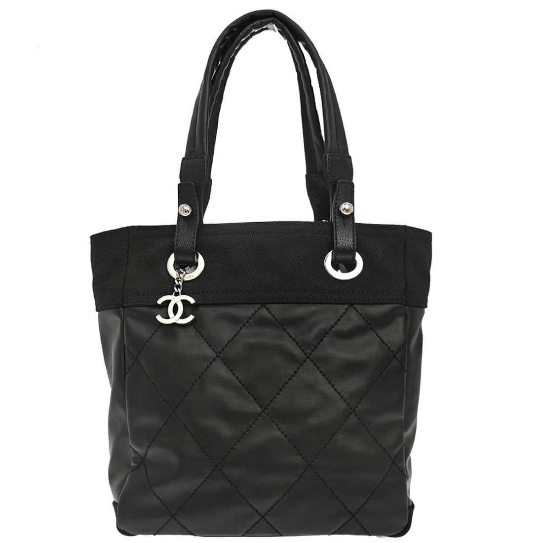 CHANEL Paris-Biarritz PM Black Canvas Tote Handbag: CHANEL Paris-Biarritz PM Black Canvas Tote Handbag Chanel Paris-Biarritz Tote PM handbag in black canvas with a zip closure and double handles. It features inner pockets, a logo accent, and is made in