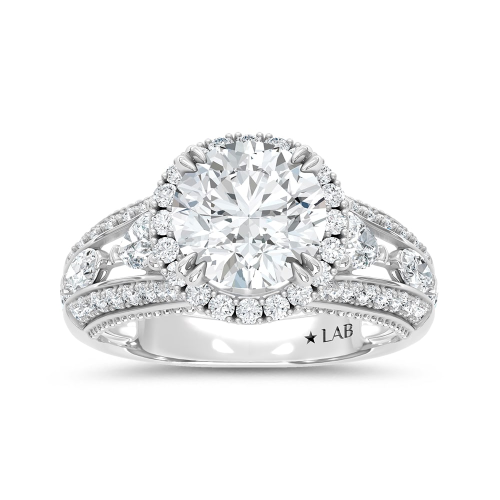 14K White Gold Lab Grown Diamond 3 1/3 Ct.Tw. Round Shape Engagement Ring: 14K White Gold Lab Grown Diamond 3 1/3 Ct.Tw. Round Shape Engagement Ring Celebrate your forever moment with the timeless brilliance of our Halo Diamond Engagement Ring. This exquisite piece features 