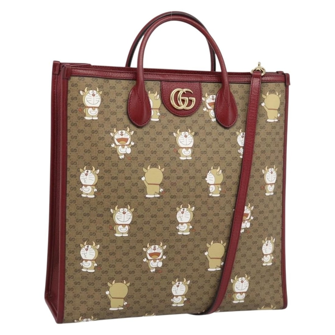 Gucci Doraemon 654345 2way handbag in Micro GG PVC leather: Gucci Doraemon 654345 2way handbag in Micro GG PVC leather Gucci Doraemon Micro GG 2-way handbag in beige PVC leather with gold-tone accents. Designed for women, this Italian-made bag includes a dust 