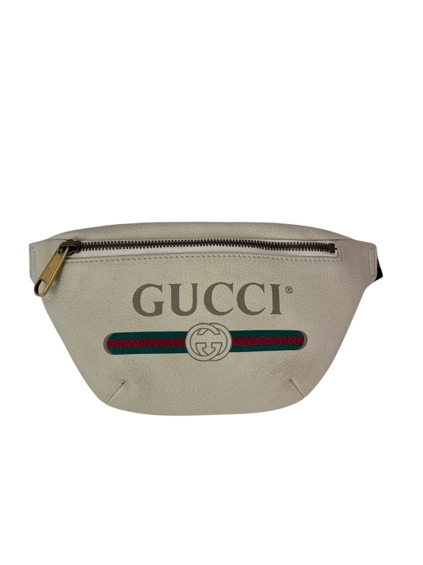 Gucci Logo Belt Bag White Leather Web Crossbody: Gucci Logo Belt Bag White Leather Web Crossbody This Gucci Logo White Leather Web Belt Sling Bag is a stylish and functional accessory perfect for casual travel. The bag features a trapezoid shape wit