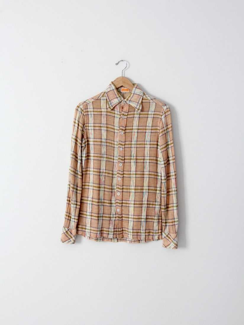 1970s Lovelord Peach Gauze Cotton Shirt Southwest Plaid: 1970s Lovelord Peach Gauze Cotton Shirt Southwest Plaid This vintage 1970s gauze cotton shirt features a southwestern-inspired button-down style in a lovely peach tone, adorned with a blue, green, and