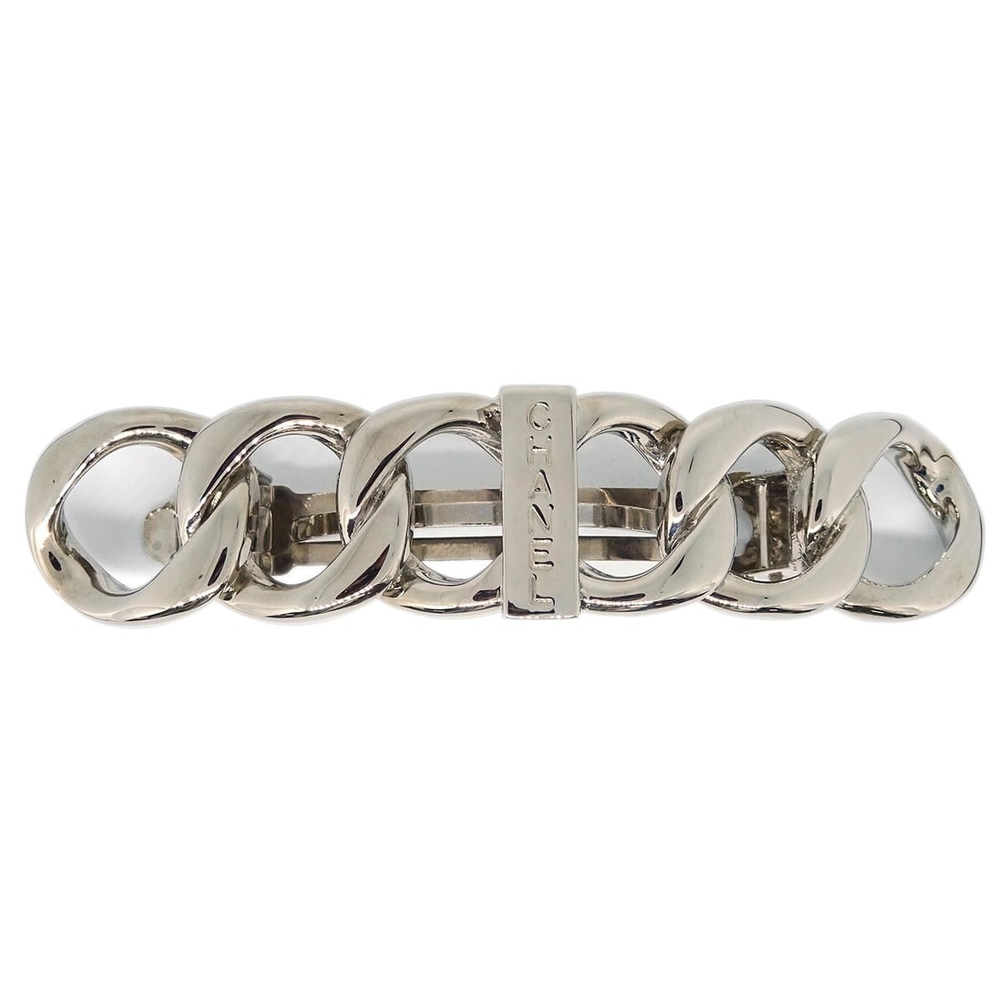 CHANEL Silver Plated Logo Barrette Hair Clip France: CHANEL Silver Plated Logo Barrette Hair Clip France Silver-plated hair barrette in a silver color with a logo accent. It is described as being in very good condition with minor discoloration and comes