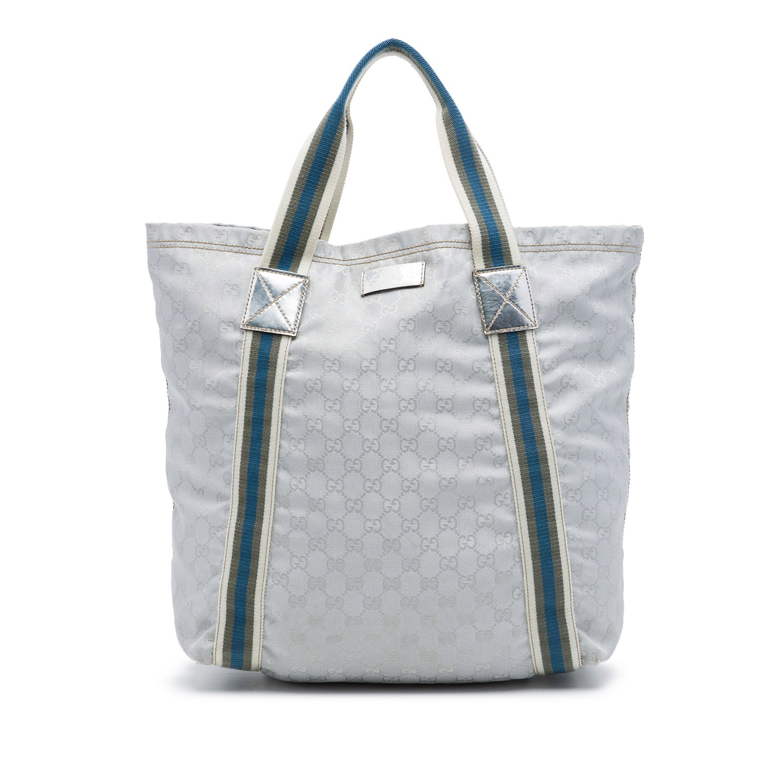 Gucci GG Web Canvas Tote Bag Gray Fabric: Gucci GG Web Canvas Tote Bag Gray Fabric Gucci GG Canvas Web Tote crafted with a canvas body, flat straps, an open top, and interior slip pockets. This gray tote is made in Italy and shows visible wea