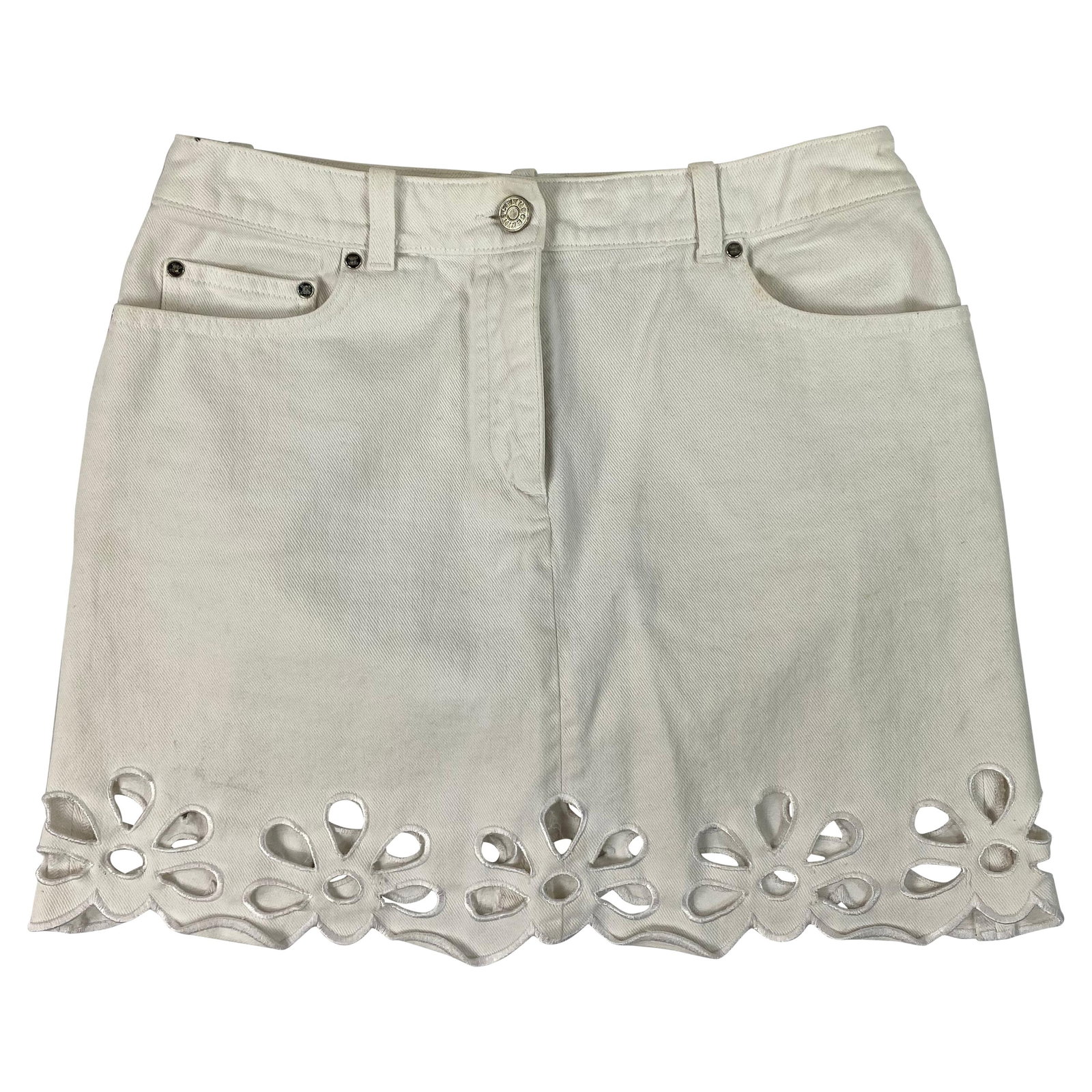Celine mini denim skirt in white EU 40: Celine mini denim skirt in white EU 40 Celine white denim mini skirt in a mini length design with floral cut-offs at the bottom and silver tone hardware. Marked size 40 (EU). Condition: Excellent. Spe