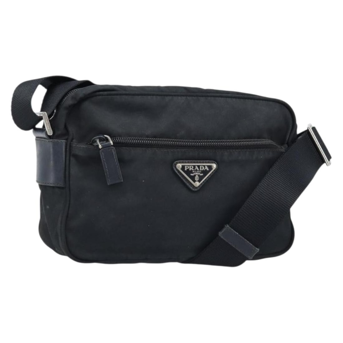 Prada black nylon women s shoulder bag Italy silver trim: Prada black nylon women s shoulder bag Italy silver trim This PRADA shoulder bag features a sleek black and silver design crafted from durable nylon. Made in Italy, the bag is designed for women and o