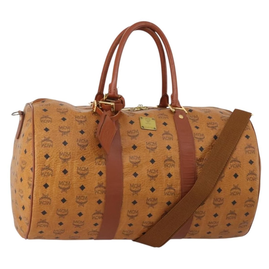 MCM Vicetos 2way Boston Bag Brown PVC Leather Gold Tone: MCM Vicetos 2way Boston Bag Brown PVC Leather Gold Tone MCM logogram Vicetos 2-way Boston bag in brown and gold PVC leather. This women's bag includes a shoulder strap, name tag, and Powanie. Made in 