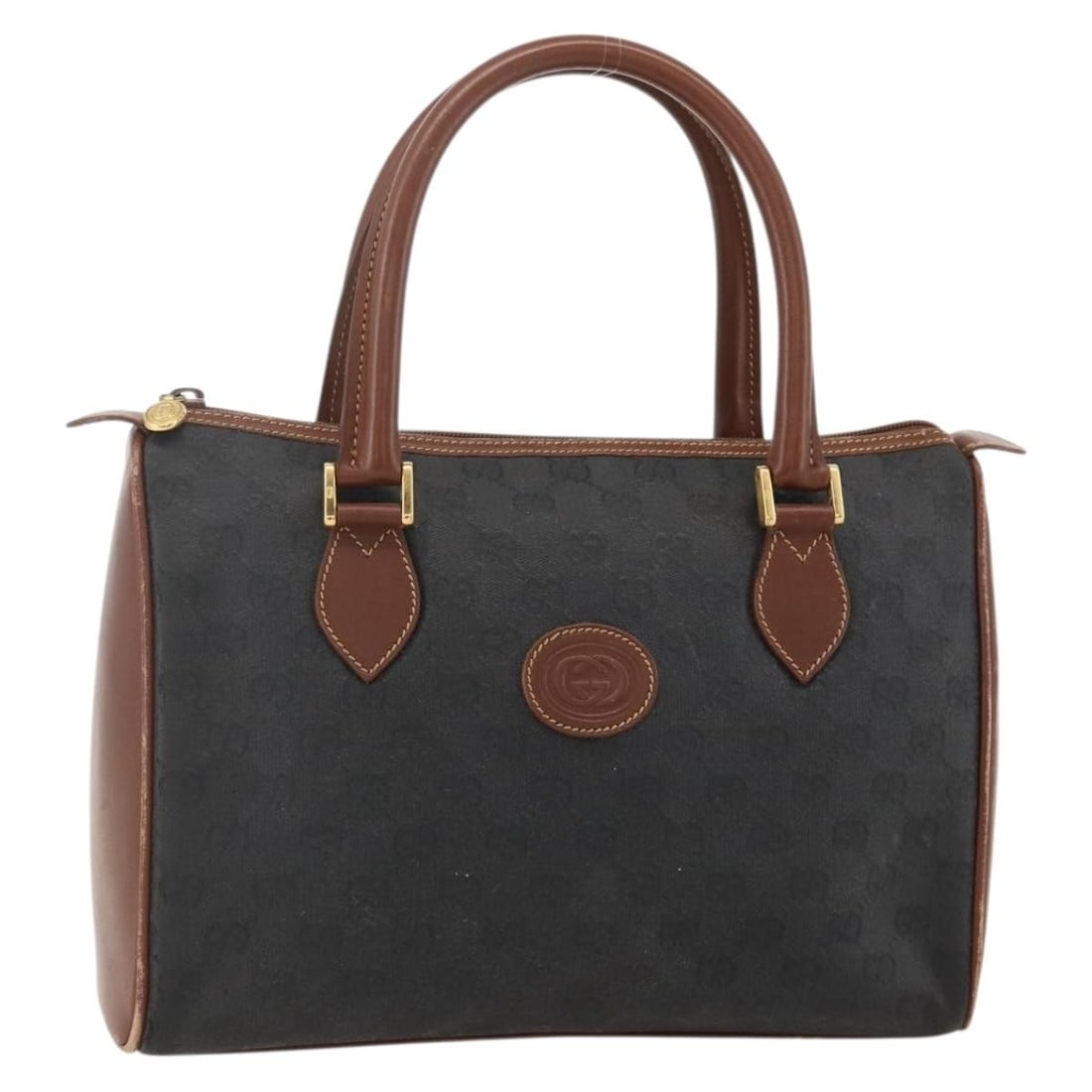 Gucci 002 58 0159 GG Canvas Handbag Black Gold Tone: Gucci 002 58 0159 GG Canvas Handbag Black Gold Tone A Gucci women's hand bag in black and gold GG canvas, made in Italy. The bag features a handle drop of approximately 4.7 inches (12 cm) and measures