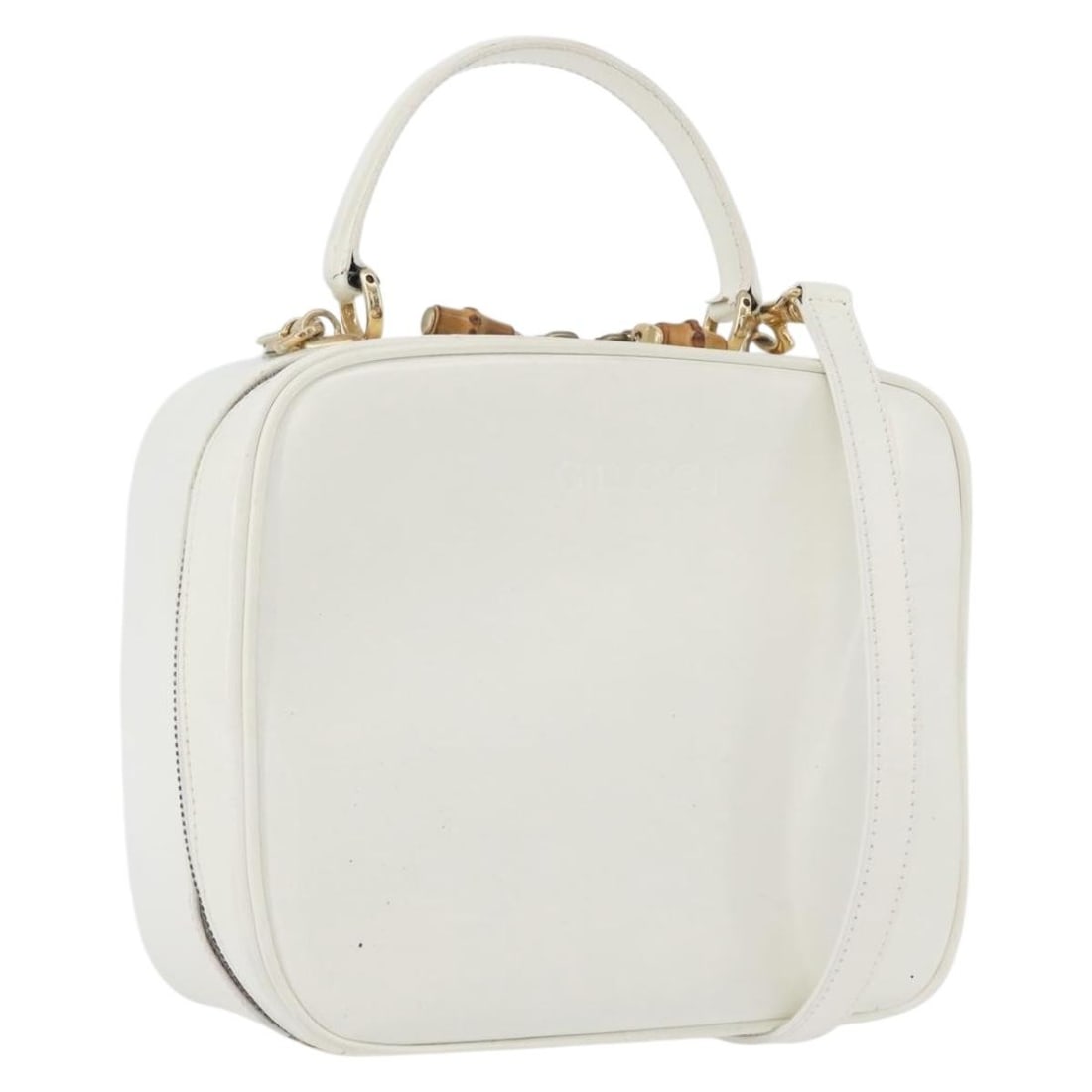 Gucci Bamboo patent leather white gold shoulder bag with strap: Gucci Bamboo patent leather white gold shoulder bag with strap This GUCCI Bamboo Vanity Hand Bag is crafted from patent leather in a white and gold color combination. Designed for versatile use, it fe