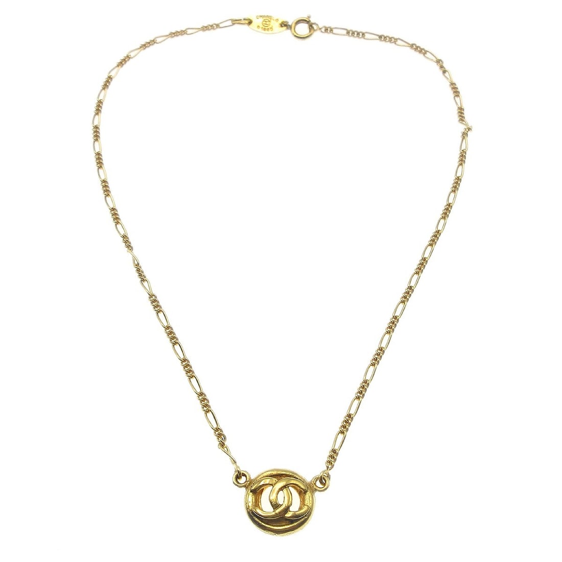 Chanel Medallion Pendant Necklace Gold Tone 1983 France: Chanel Medallion Pendant Necklace Gold Tone 1983 France Vintage Chanel medallion chain pendant necklace from 1983, crafted in a gold-tone finish with a round medallion charm. Made in France, this pend