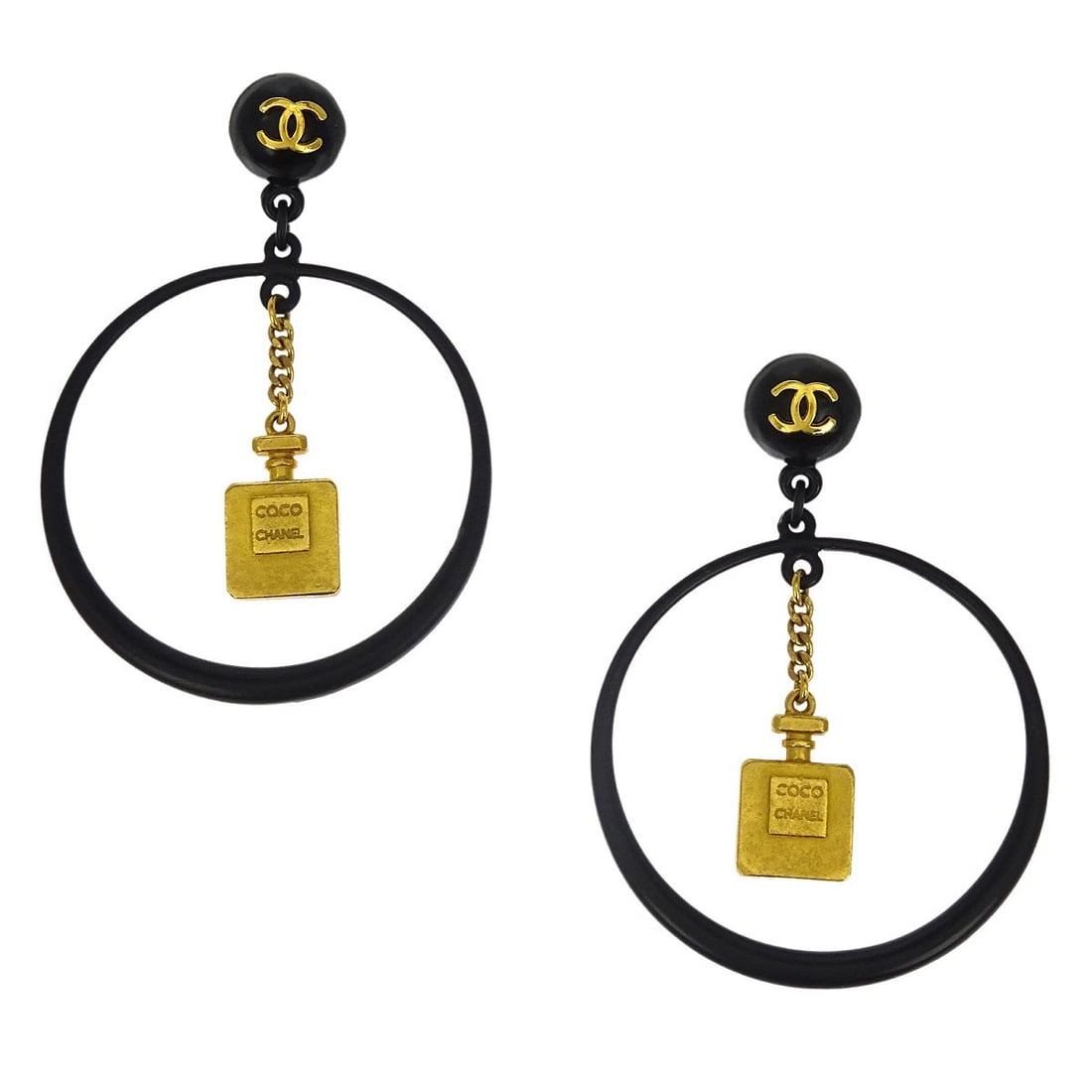 Chanel 94C Clip On Dangle Earrings Gold Plated Black Logo: Chanel 94C Clip On Dangle Earrings Gold Plated Black Logo Vintage Chanel clip-on dangle earrings featuring a round hoop design with black perfume bottle motifs and logo styling. Made in France, these 