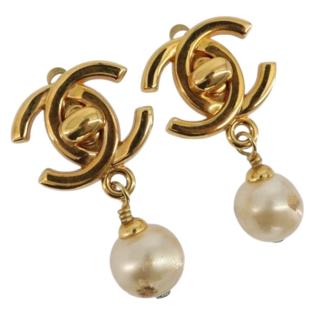 CHANEL CC Turn Lock Gold Tone Metal Earrings France: CHANEL CC Turn Lock Gold Tone Metal Earrings France CHANEL turn lock earrings in metal with a gold tone finish, made in France. The listing notes that only the item shown in the photo is included, wit