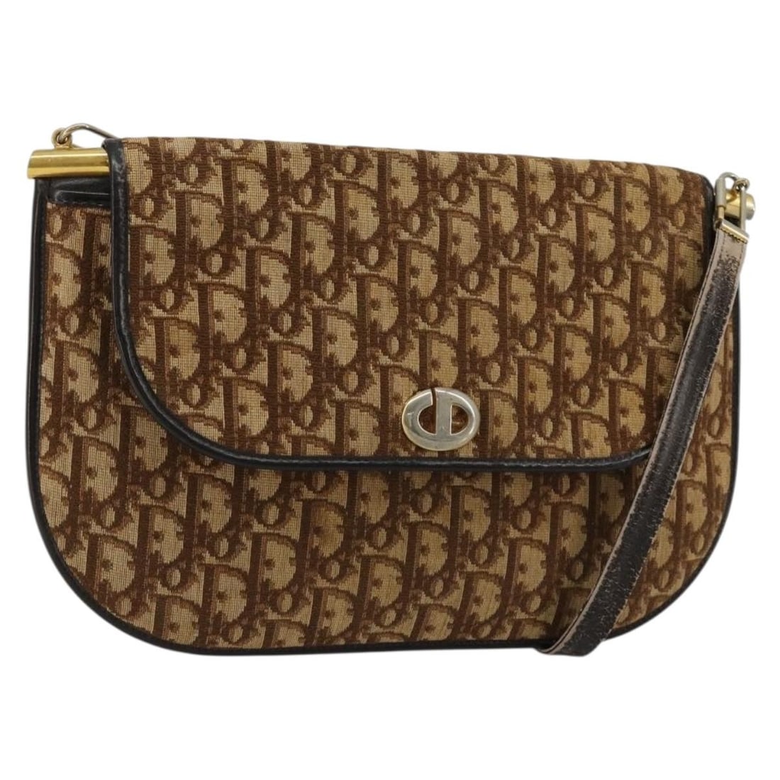 Christian Dior Trotter Shoulder Bag in Brown Gold Canvas: Christian Dior Trotter Shoulder Bag in Brown Gold Canvas Christian Dior shoulder bag in Trotter Canvas with a brown and gold colorway. Made in France and designed for women, this bag features a should