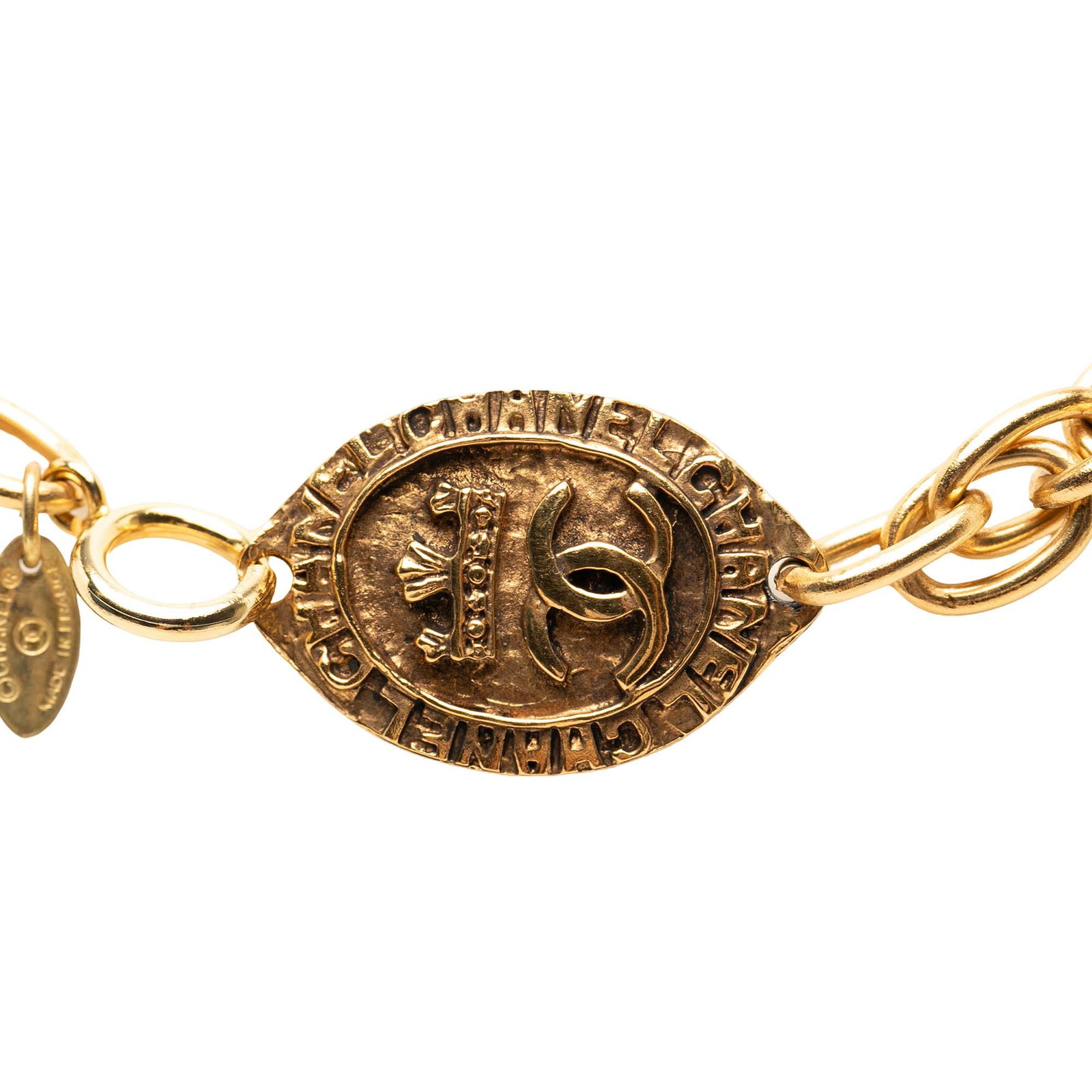 Chanel Double Chain Necklace with CC Oval Medallion Gold Plated: Chanel Double Chain Necklace with CC Oval Medallion Gold Plated Gold plated Chanel CC oval medallion pendant double chain necklace with a spring ring closure. Made in France, this costume piece is cra