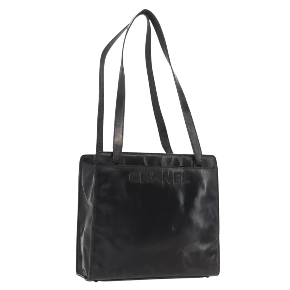 Chanel Black Patent Leather Tote with Gold CC Logo and Guarantee Card: Chanel Black Patent Leather Tote with Gold CC Logo and Guarantee Card This CHANEL women's tote bag is crafted from black patent leather with gold accents. The bag features a spacious interior and is m