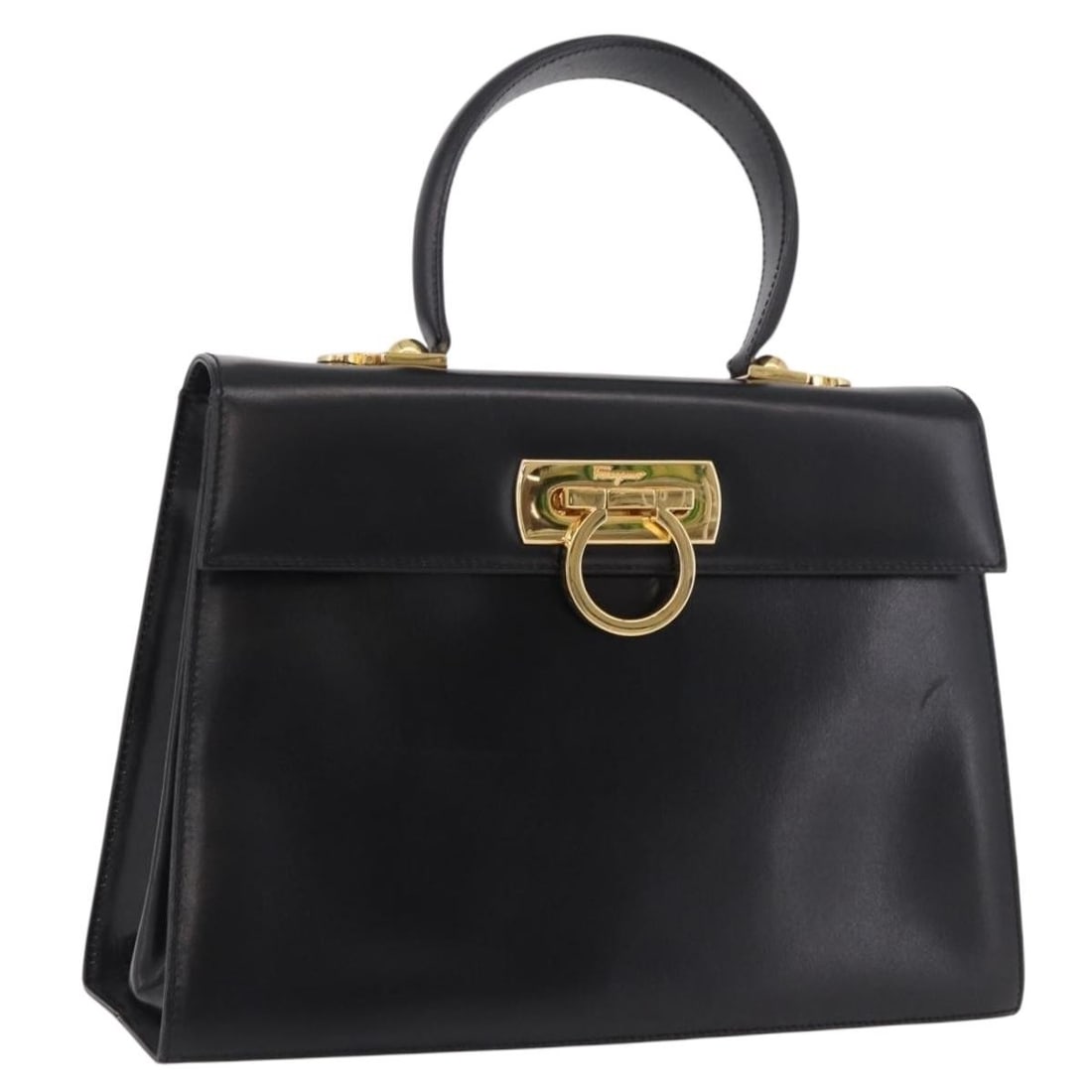 Salvatore Ferragamo Gancini black leather 2way handbag gold tone: Salvatore Ferragamo Gancini black leather 2way handbag gold tone Salvatore Ferragamo Gancini handbag in leather, presented in black and gold. This 2-way style is made in Italy and is designed for wome