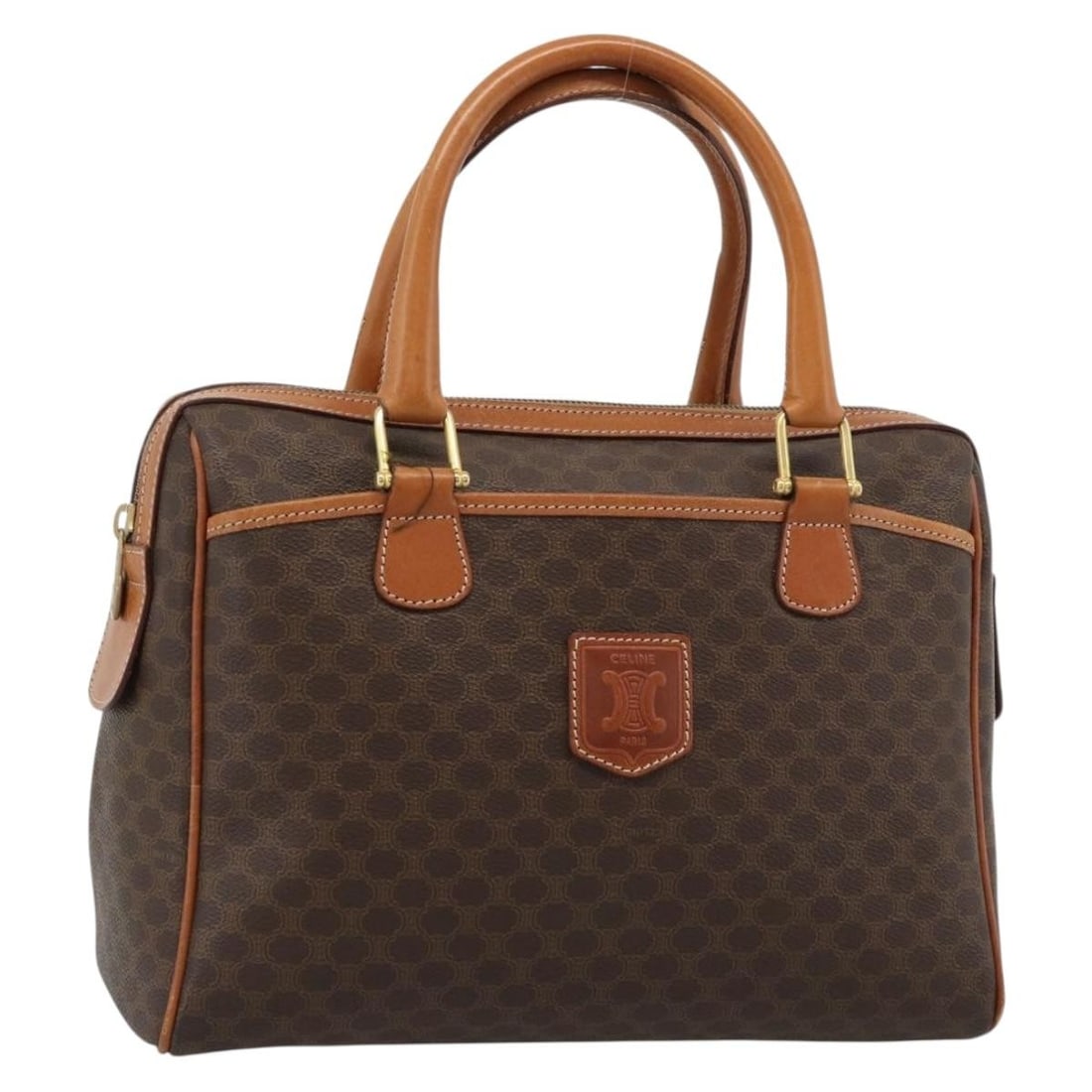 CELINE Macadam Boston Bag Brown PVC Leather Canvas Italy: CELINE Macadam Boston Bag Brown PVC Leather Canvas Italy Celine Macadam canvas Boston bag in brown with gold-tone accents, crafted in PVC leather and made in Italy. This women's handbag is offered wit