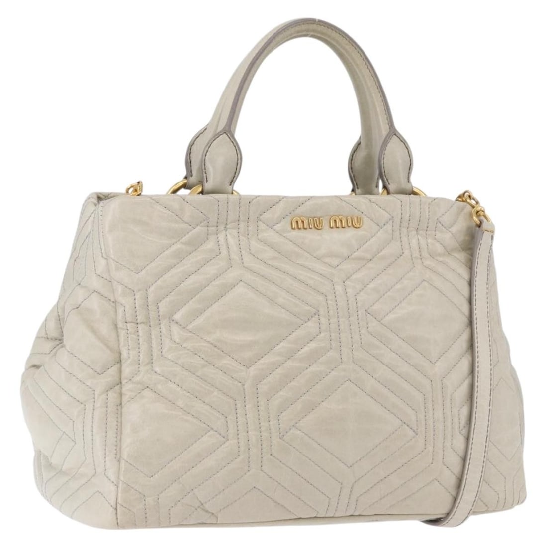 Miu Miu Matelasse Leather 2way Handbag Beige Gold Strap: Miu Miu Matelasse Leather 2way Handbag Beige Gold Strap Miu Miu matelasse 2-way handbag in beige leather with gold-tone accents. Designed for women, this bag includes a shoulder strap for handheld or 