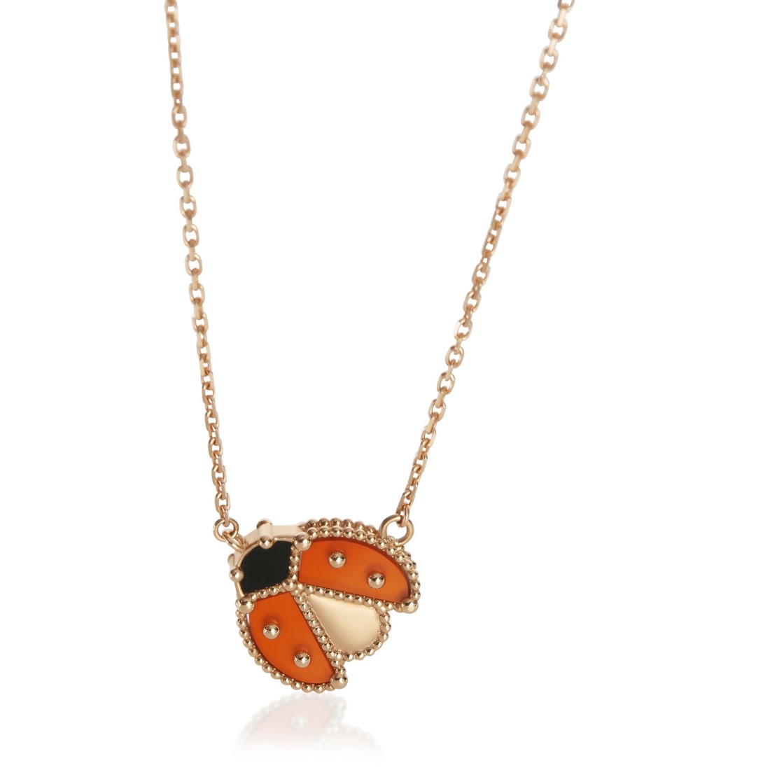 Van Cleef & Arpels Lucky Spring Pendant 18k Rose Gold Carnelian Onyx: Van Cleef & Arpels Lucky Spring Pendant 18k Rose Gold Carnelian Onyx Pre-owned Van Cleef & Arpels Lucky Spring pendant featuring carnelian and onyx in rose gold. Includes the original box/packaging an