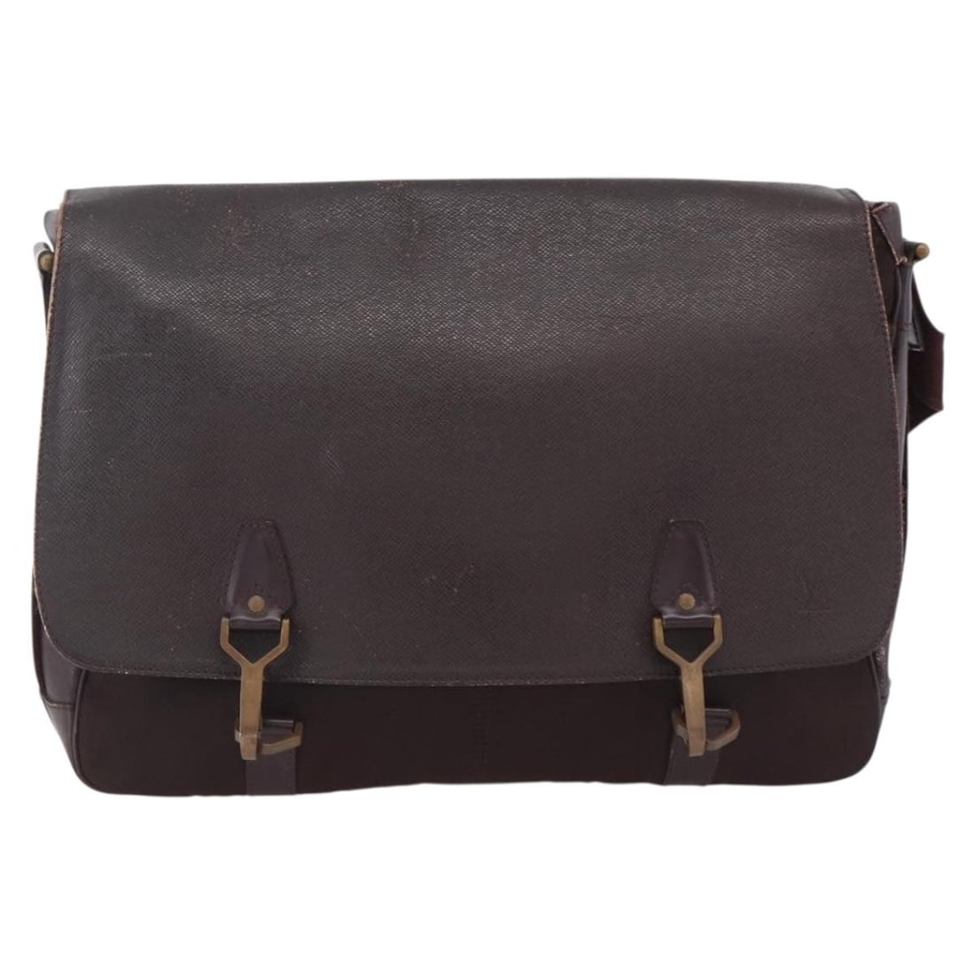 Dersou Unisex Bag in Brown Taiga Leather and Canvas by Louis Vuitton: Dersou Unisex Bag in Brown Taiga Leather and Canvas by Louis Vuitton The Louis Vuitton Dersou Bag features a combination of Taiga leather and canvas in a brown color, designed for unisex use. This bag