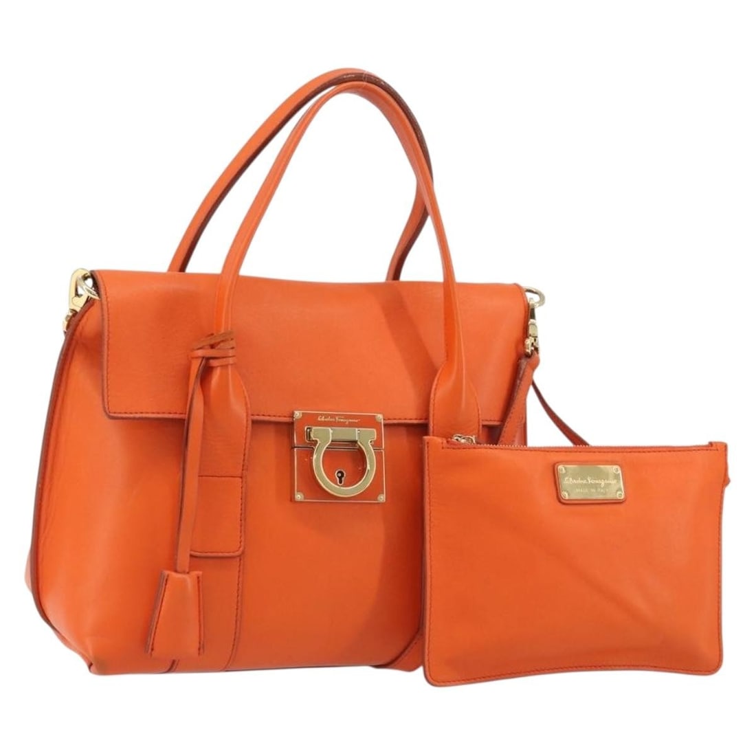 Salvatore Ferragamo Gancini 2way leather handbag orange with strap pouch: Salvatore Ferragamo Gancini 2way leather handbag orange with strap pouch Salvatore Ferragamo Gancini 2-way handbag in orange leather with gold-tone accents. This women's bag includes a top handle and 