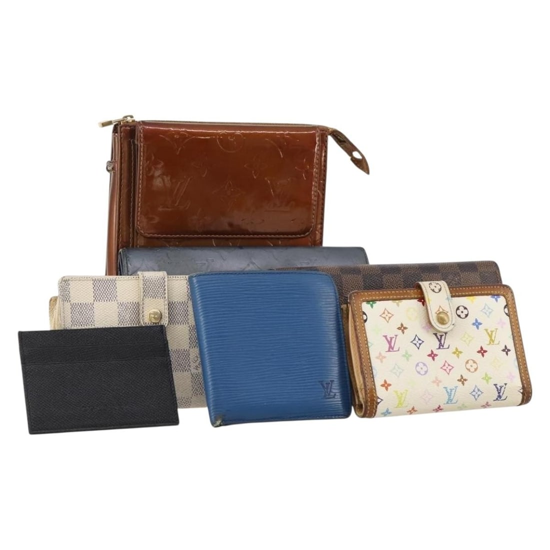 7 Piece Wallet Set Louis Vuitton Monogram Canvas White Blue Bronze: 7 Piece Wallet Set Louis Vuitton Monogram Canvas White Blue Bronze A Louis Vuitton wallet in white, blue, and bronze, made from monogram canvas. This special set offer is listed as a wallet and is in 