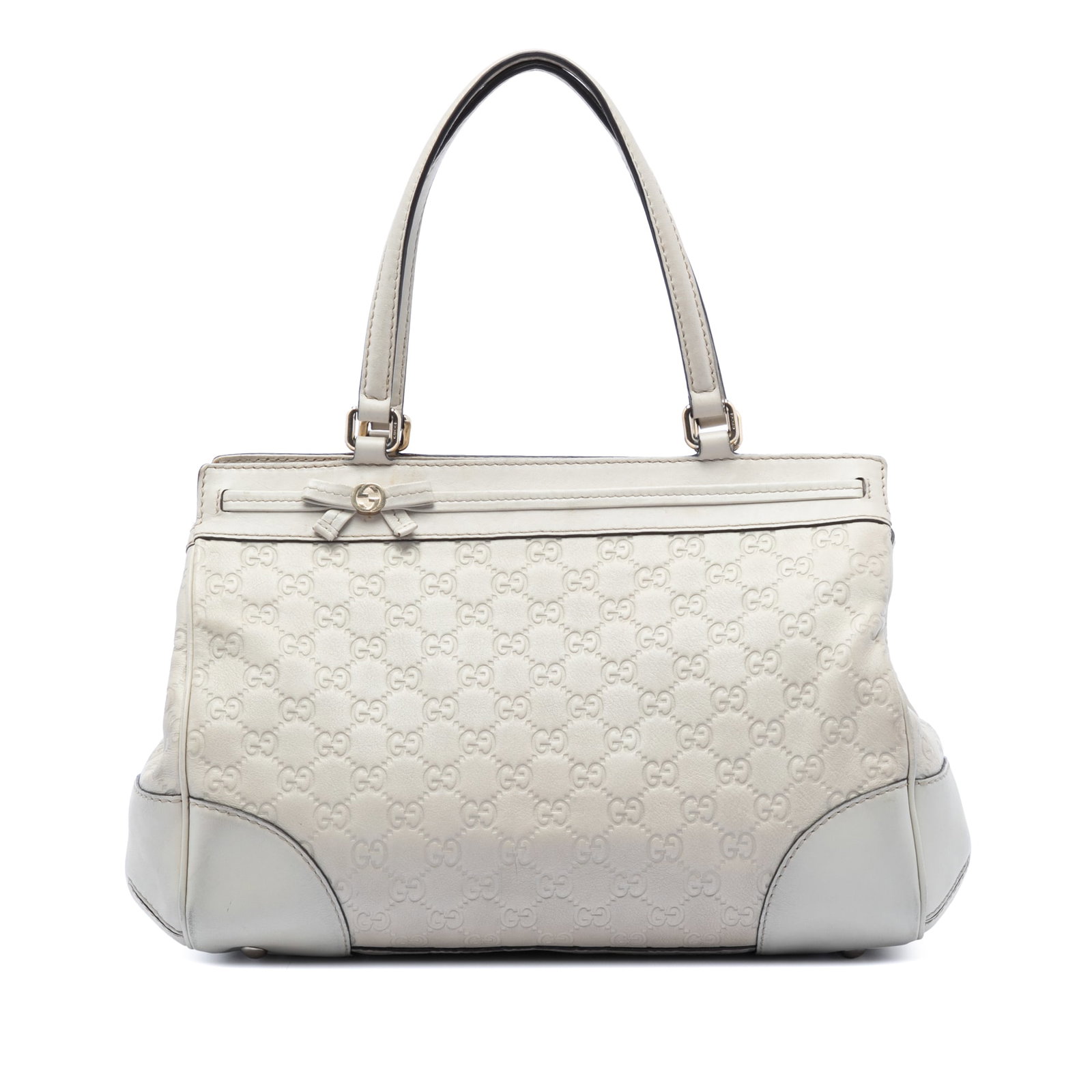 Gucci Mayfair White Leather Tote with Embossed Guccissima Pattern: Gucci Mayfair White Leather Tote with Embossed Guccissima Pattern The Mayfair Tote showcases an embossed leather exterior, flat leather straps, and a distinctive ribbon detail at the top panel. It fea