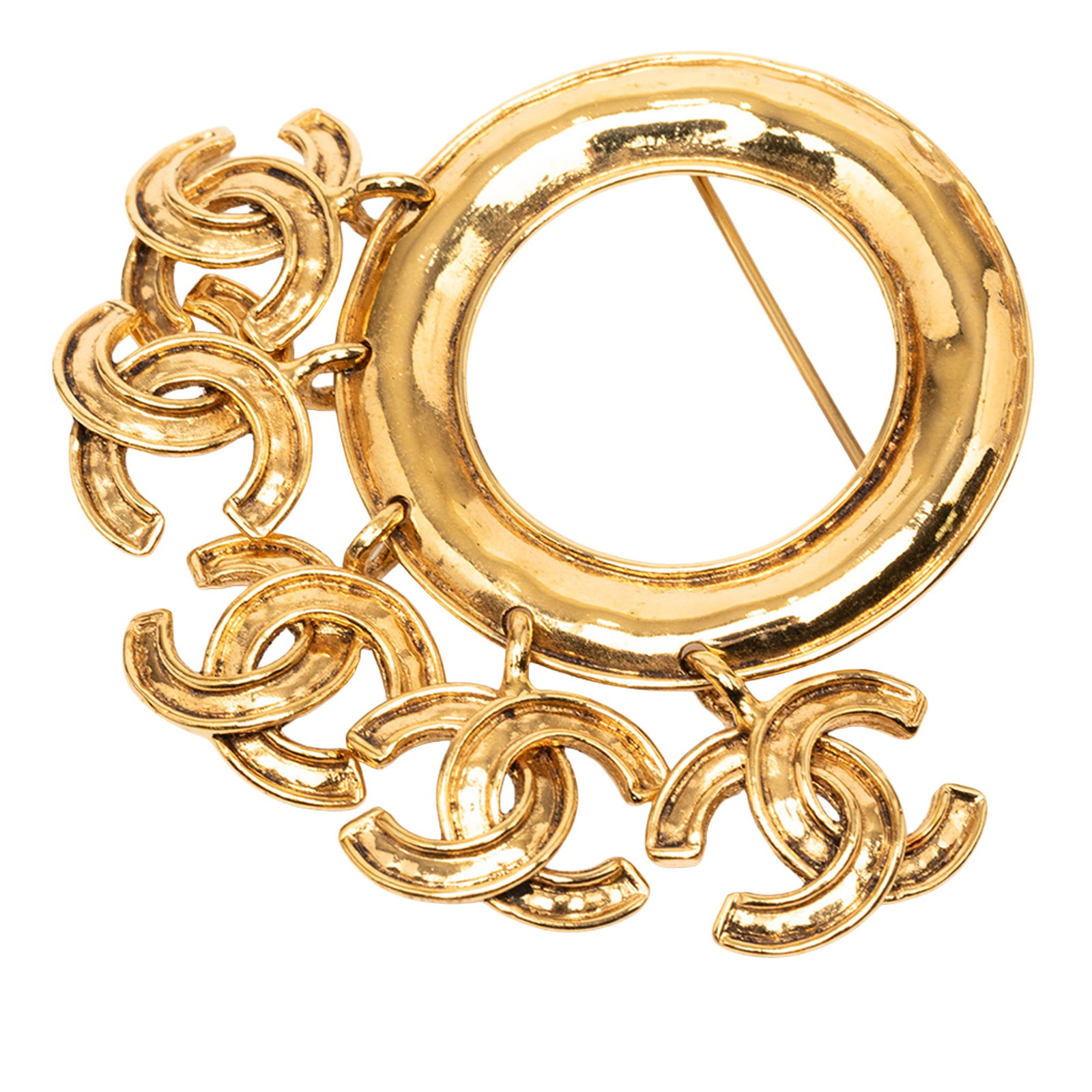 Chanel Gold Tone CC Ring Brooch with Five Charms: Chanel Gold Tone CC Ring Brooch with Five Charms Gold plated metal brooch with a back pin closure. It is a costume piece from France in gold color, with a CC charm ring design. Condition is B+ with no