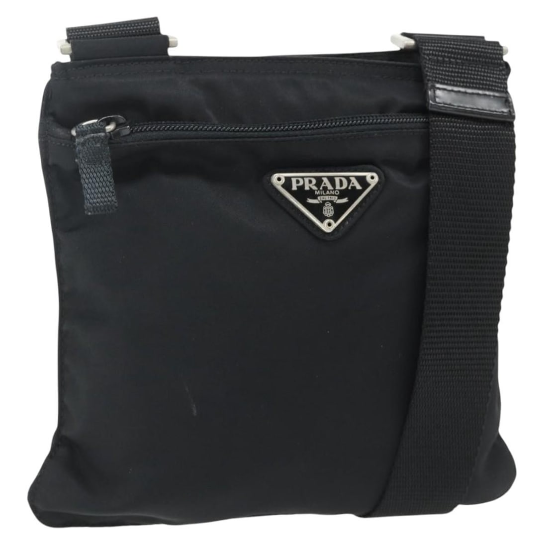 Prada black nylon shoulder bag Italy silver trim: Prada black nylon shoulder bag Italy silver trim This Prada shoulder bag is crafted from black nylon with silver-tone accents and features an adjustable shoulder strap. Made in Italy, it is designed f