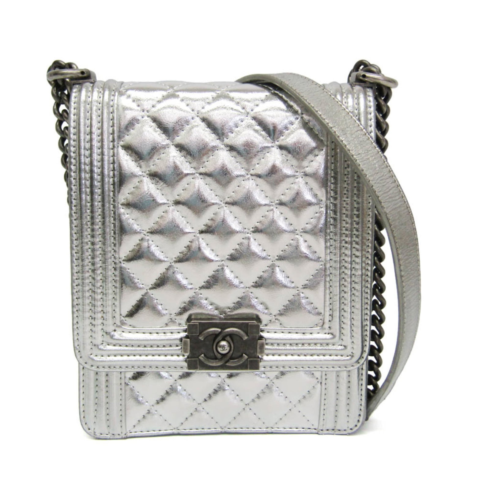 Chanel North South Boy Flap metallic silver leather bag: Chanel North South Boy Flap metallic silver leather bag Chanel North South Boy Flap bag in silver quilted metallic calfskin. Made in Italy, this women's bag features a structured silhouette with noted