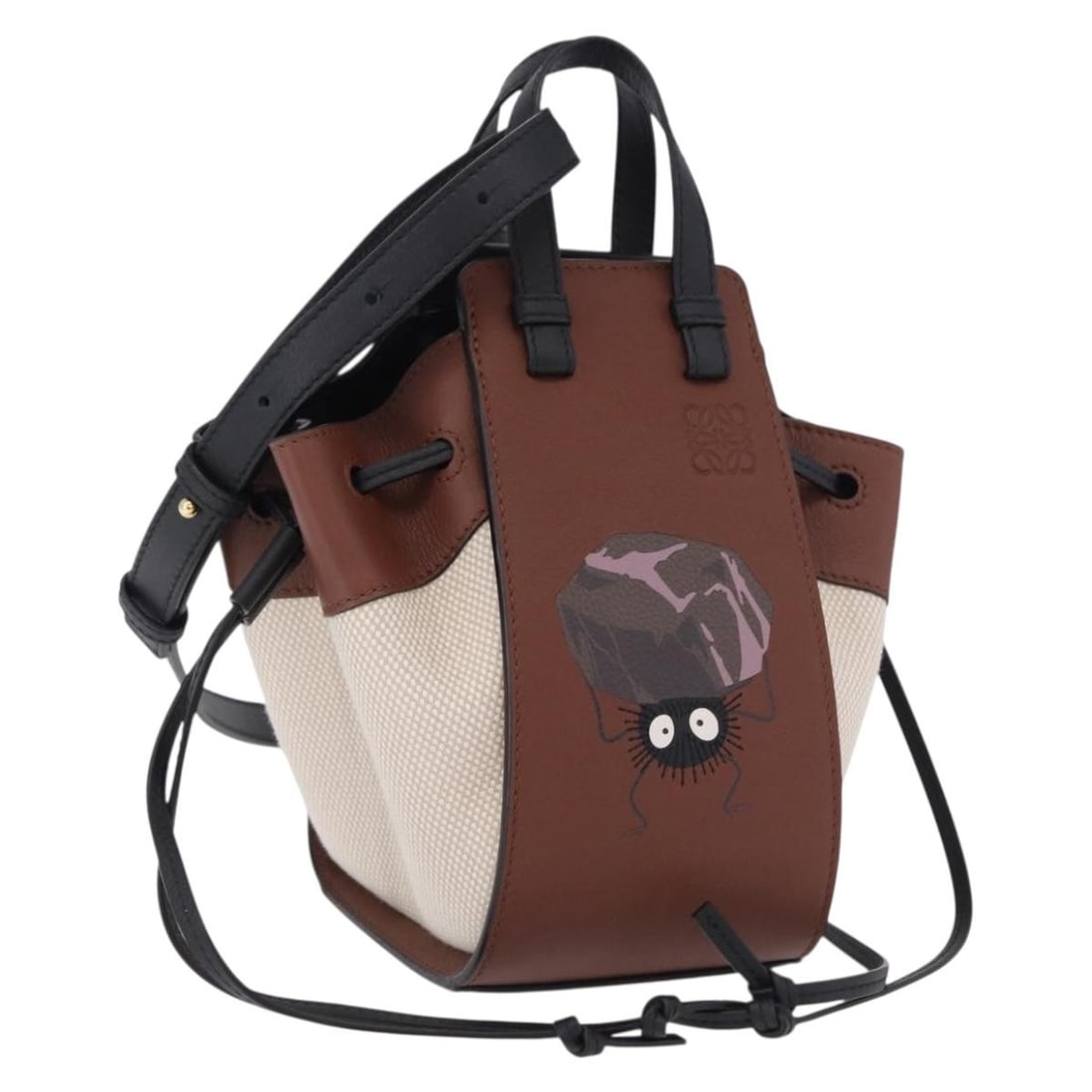LOEWE Hammock Mini Drawstring 2way Hand Bag Brown Canvas: LOEWE Hammock Mini Drawstring 2way Hand Bag Brown Canvas LOEWE Studio Ghibli Hammock Drawstring Mini Bag in brown canvas, presented as a women's handbag made in Spain. It includes a shoulder strap and