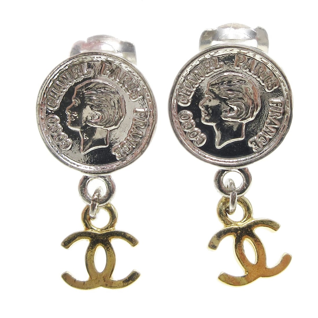 CHANEL Medallion Clip On Dangle Earrings Gold and Silver Tone 97P: CHANEL Medallion Clip On Dangle Earrings Gold and Silver Tone 97P Clip-on Chanel medallion dangle earrings in gold and silver tones, marked 97P and made in France. These earrings feature a dangle/drop