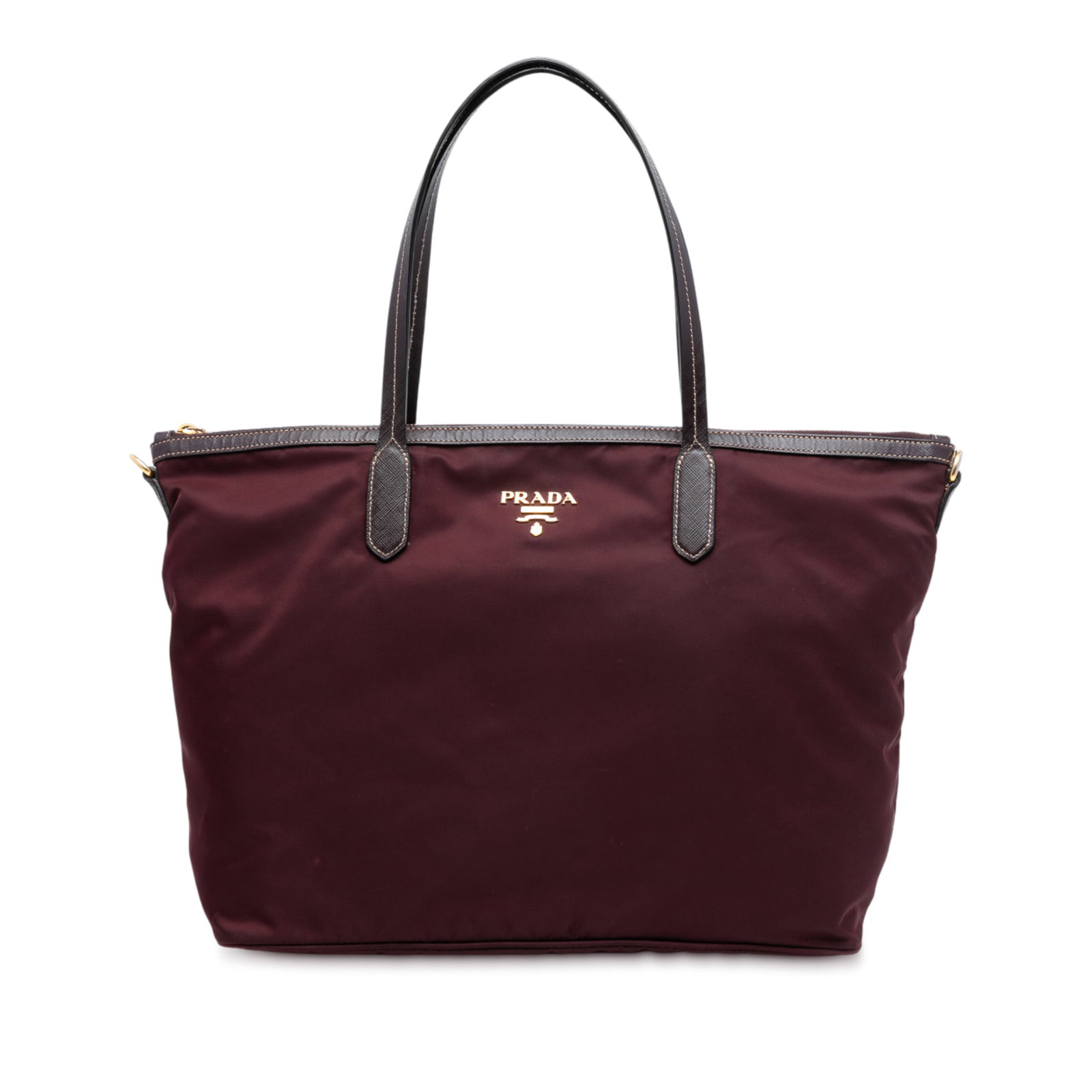 Red Tessuto Nylon Satchel with Saffiano Leather Accents by Prada: Red Tessuto Nylon Satchel with Saffiano Leather Accents by Prada This Prada Saffiano Trimmed Tessuto Satchel showcases a red nylon body complemented by flat leather handles. It features a top zip clos