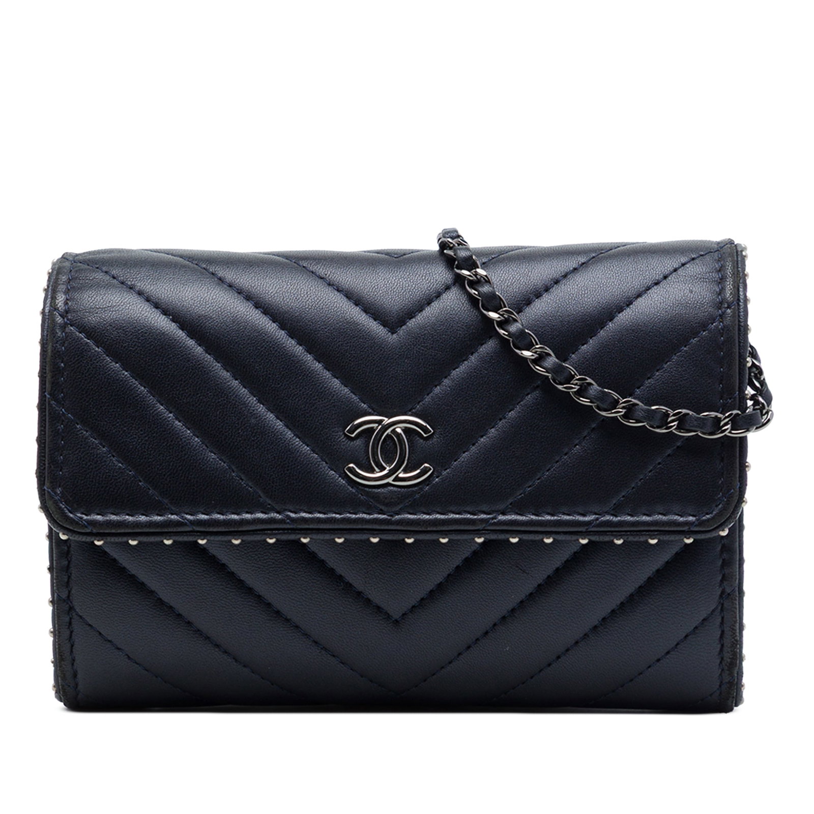 Chanel CC Chevron Studded Lambskin Wallet on Chain Blue: Chanel CC Chevron Studded Lambskin Wallet on Chain Blue Chanel wallet on chain in blue chevron lambskin leather with studded detailing. It features a leather-woven chain shoulder strap, a flap with sn