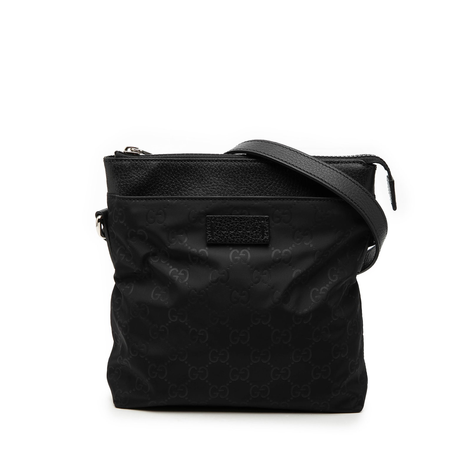 Gucci GG Nylon Black Crossbody Bag with Leather Trim: Gucci GG Nylon Black Crossbody Bag with Leather Trim Gucci GG Nylon Crossbody bag in black with leather trim and a flat leather strap. The bag features a top zip closure, an exterior zip pocket, and i