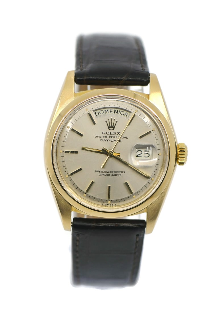 Rolex Day-Date Ref 1803 18K Yellow Gold Wristwatch: Rolex Day-Date Ref 1803 18K Yellow Gold Wristwatch Pre-owned Rolex Day-Date wristwatch with automatic mechanical movement and analog display. This men's watch features a silver dial, a 36 mm yellow go