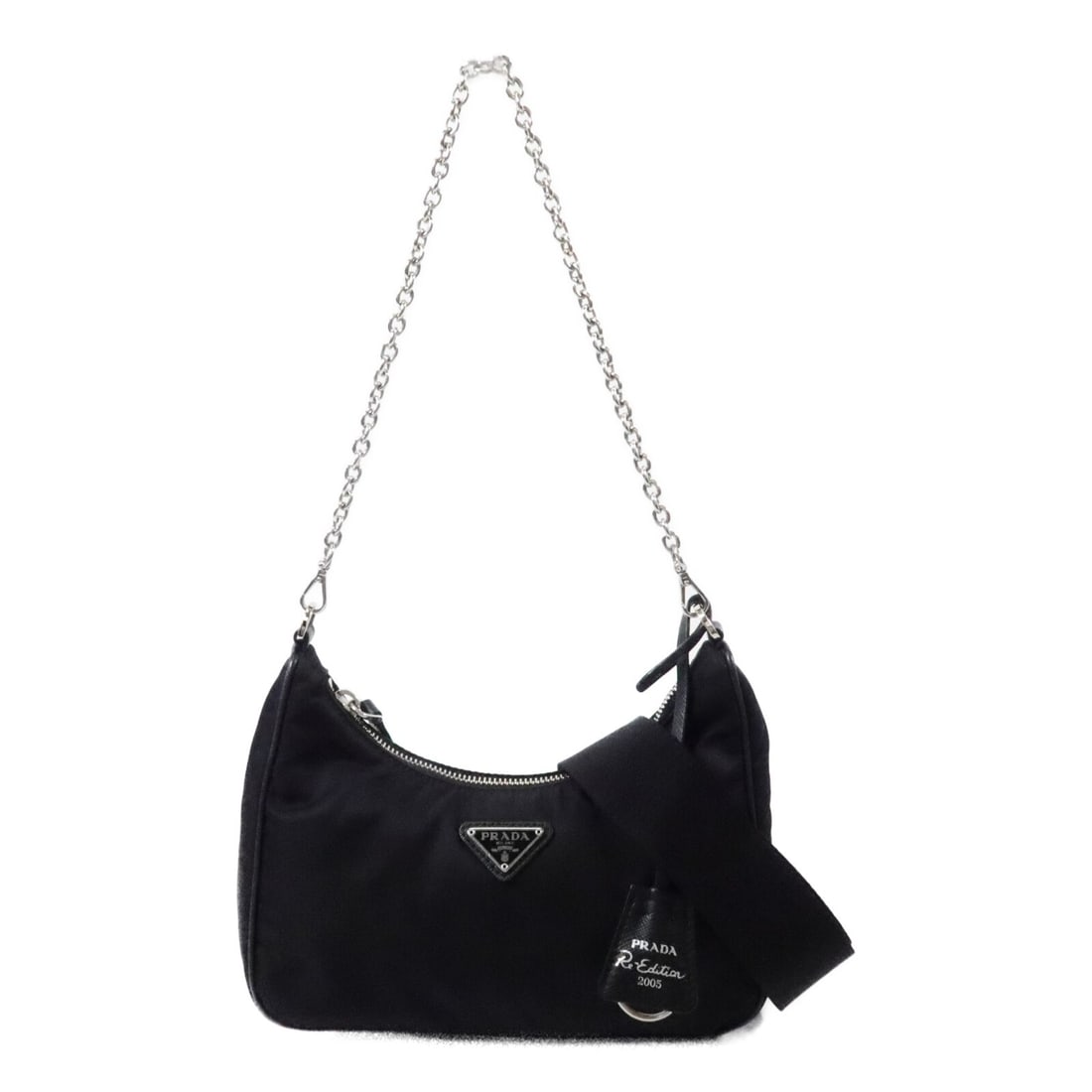 PRADA Re-Edition 2005 Nylon Shoulder Bag 1BH204 Black SHW: PRADA Re-Edition 2005 Nylon Shoulder Bag 1BH204 Black SHW Prada Re-Edition 2005 shoulder bag in black nylon with silver-tone hardware. This women's shoulder bag features a black exterior and includes 