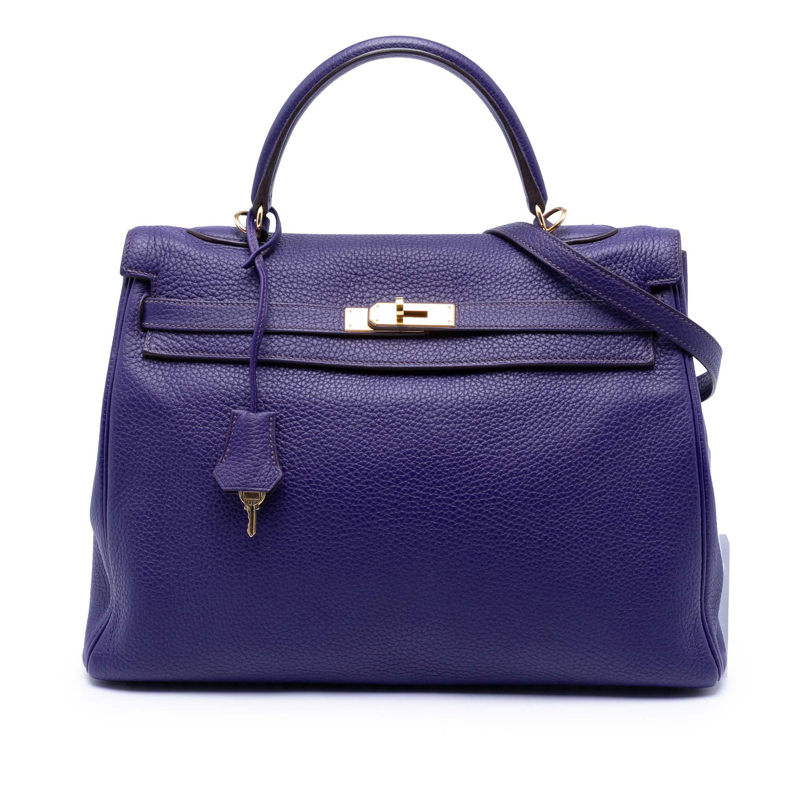 Hermes Kelly II Retourne 35 Togo leather Iris handbag: Hermes Kelly II Retourne 35 Togo leather Iris handbag This Hermes Kelly II Retourne 35 is crafted from Togo leather in a striking Iris purple shade. It features a flat leather top handle, a detachable